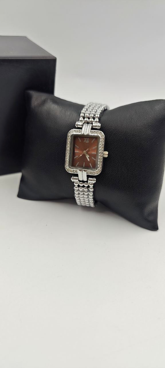 GÜMÜŞ RENK İÇİ TURUNCU BAYAN SAATİ