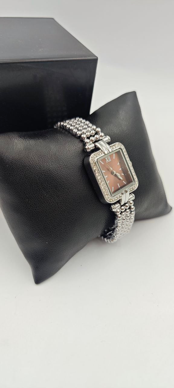 GÜMÜŞ RENK İÇİ TURUNCU BAYAN SAATİ