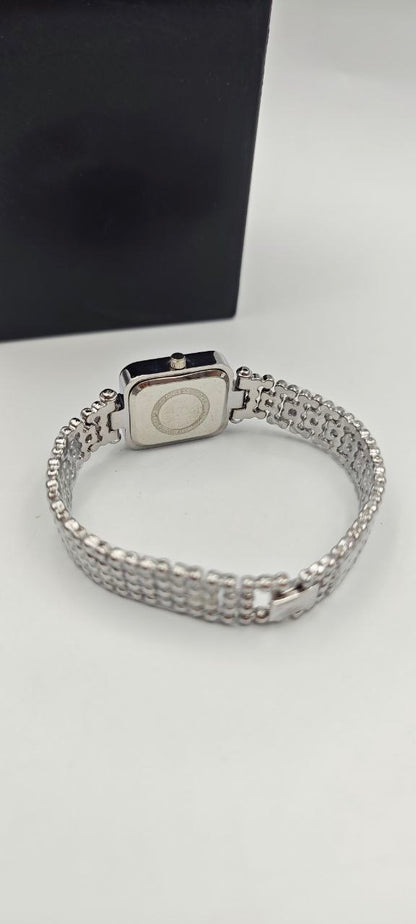 GÜMÜŞ RENK İÇİ MOR BAYAN SAATİ